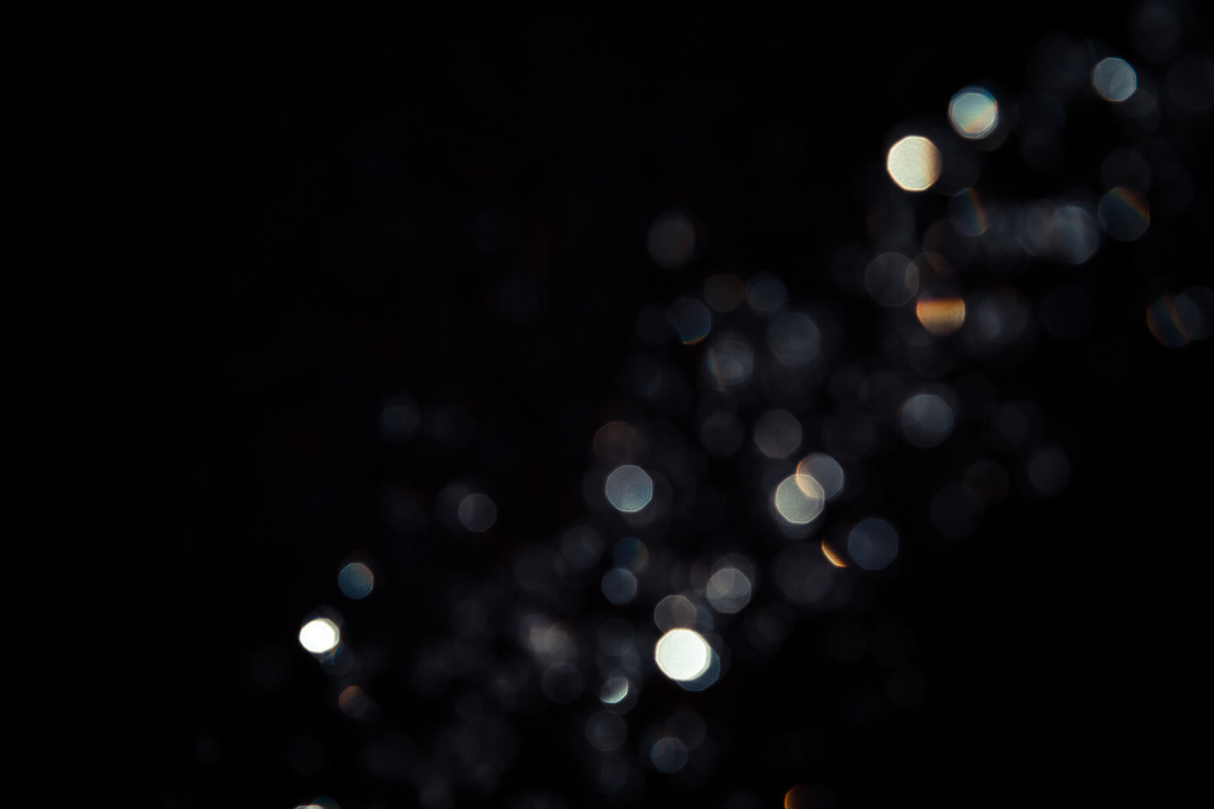 Black bokeh texture on black